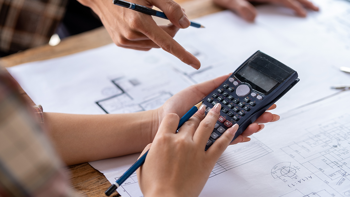 A lady calculating construction costs
