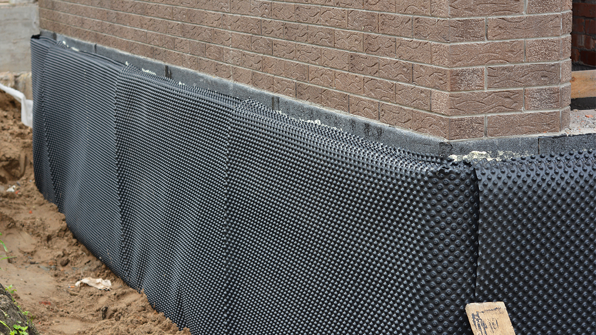 Damp proofing a stone wall